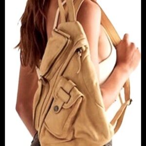 Tan Asymmetrical Backpack with Multiple Compartments